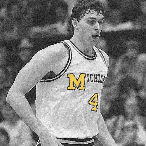 Black and white image of Tim McCormick in U of M basketball uniform