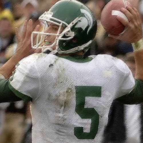 Drew Stanton in MSU uniform preparing a throw.