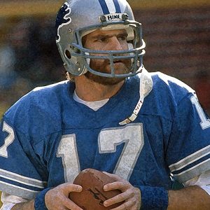 Eric Hipple in Lions uniform holding a football
